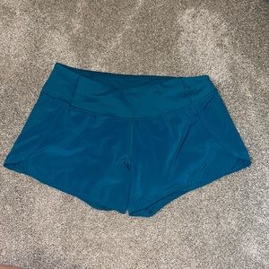 Blue Lululemon speed shorts 4”